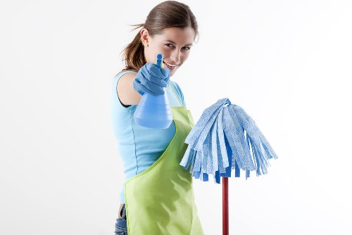 Commercial cleaners in NW2 maintaining an office workspace