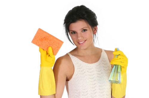 Professional facade cleaning on a building exterior in NW2