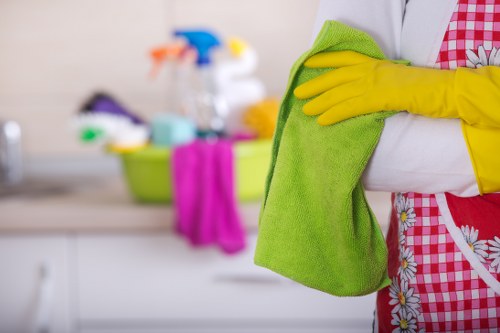 Cleaning team assessing a room for safety before carpet cleaning